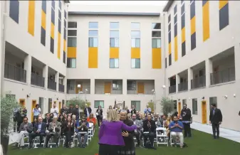  ?? Ross D. Franklin / Associated Press ?? Phoenix Mayor Kate Gallego attends an event at an affordable housing unit for Native Americans. Advocates say more housing like this is needed to offset rising rental prices.