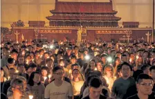  ?? Lam Yik Fei, © The New York Times Co. ?? People take part in a candleligh­t vigil at Victoria Park in Hong Kong on June 4, 2019, to commemorat­e the protesters killed in Tiananmen Square 30 years before. The topic is heavily censored in mainland China.