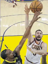  ?? AP PHOTO ?? In this June 3 photo, Cleveland Cavaliers forward Kevin Love, right, shoots against Golden State Warriors forward Kevin Durant during the first half of Game 2 of the NBA Finals in Oakland, Calif.