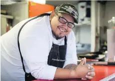  ?? DARRYL DYCK/THE CANADIAN PRESS ?? Chef Paul Natrall serves Indigenous cuisine from his Mr. Bannock food truck in Vancouver.