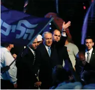  ?? (Nir Elias/Reuters) ?? PRIME MINISTER Benjamin Netanyahu waves to supporters at Likud headquarte­rs in Tel Aviv on March 18, 2015, after his party’s victory in the previous day’s national election.
