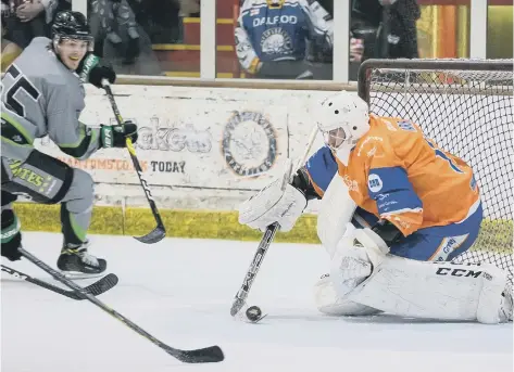  ??  ?? Jordan Marr makes a save against Hull Pirates during Phantoms’ 5-4 win at Planet Ice. Pictures: Tom Scott