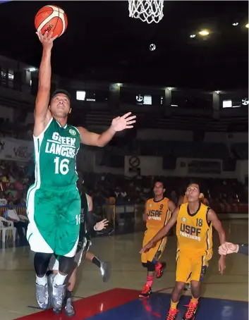  ?? PAUL JUN E. ROSAROSO ?? Franz Arong of the UV Lancers scores on an unmolested layup during their CESAFI collegiate basketball match against the USPF Panthers last night at the Cebu Coliseum. UV won, 97-56.