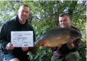  ??  ?? THIS 25lb 10oz mirror helped David and Matt Barlow to victory in the British Carp Cup qualifier at Thorney Weir, West Drayton, with four fish for 80lb 15oz.