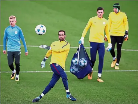  ??  ?? In rampaging mood: Goalkeeper Claudio Bravo hitting a shot during Manchester City’s training session yesterday. City play Feyenoord in the Champions League today. — Reuters