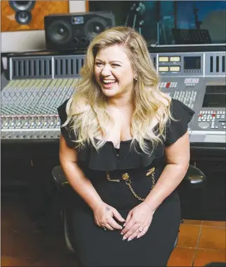  ?? KYLE DEAN REINFORD / THE NEW YORK TIMES ?? For the first time in 15 years, singer Kelly Clarkson feels as if she is driving her own career, and she has made an album rooted in her favorite sound: soul.