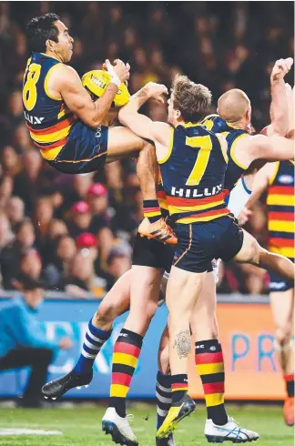  ?? Picture: Getty Images ?? Eddie Betts marks and converts the shot to put the Roos to rest.