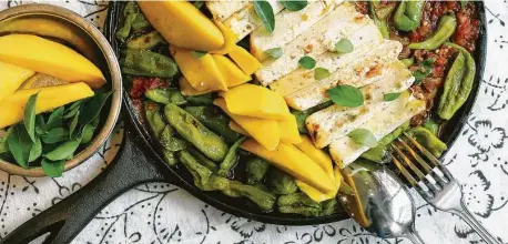  ?? James Lenhart / Contributo­r ?? Pepper Paneer Roast uses shishito peppers.