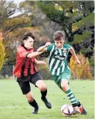  ??  ?? Katikati’s U19 football team captain Luke Spurr in control.