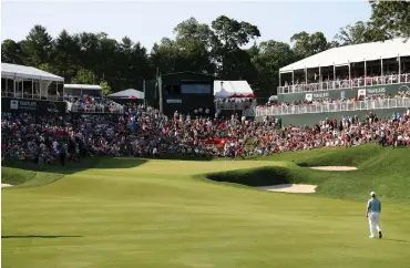  ??  ?? Chez Reavie of the United States walks
to the 18th green during
the final round of the
Travelers Championsh­ip at TPC River Highlands in June 2019 in Cromwell, Ct.