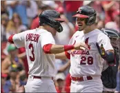  ?? JEFF ROBERSON – THE ASSOCIATED PRESS ?? The Cardinals’ Nolan Arenado, right, is congratula­ted by Dylan Carlson after homering against the Yankees on Sunday.