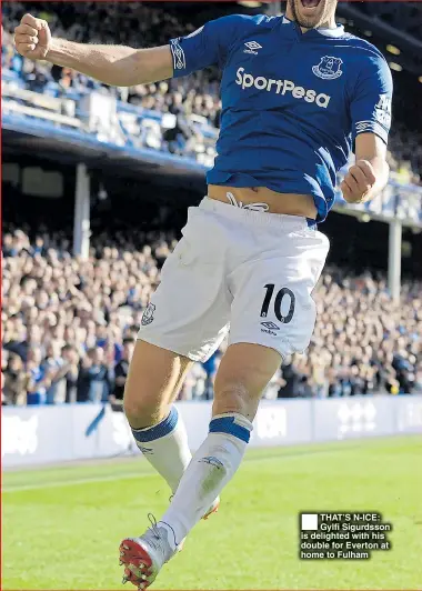  ??  ?? THAT’S N-ICE: Gylfi Sigurdsson is delighted with his double for Everton at home to Fulham