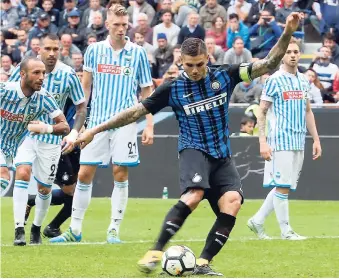  ?? AP ?? Inter Milan’s Mauro Icardi (second right) scores during the Serie A match between Inter Milan and Spal at the San Siro Stadium in Milan, Italy, yesterday.