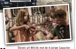  ??  ?? Steven uit Wilrijk met de 6-jarige Capucine uit Avignon. “Ze speelde nog maar twee maanden viool en was zo gelukkig dat ze mocht meespelen.”