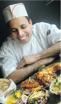  ??  JULIE OLIVER / OTTAWA CITIZEN ?? Kochin Kitchen’s chef and co-owner Anil Oorkolil, in the ByWard Market restaurant that features Indian cuisine.