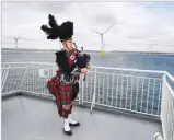  ??  ?? GETTY IMAGES A piper is seen at the launch of the European Offshore Wind Deployment Center in Aberdeen Bay earlier this month.