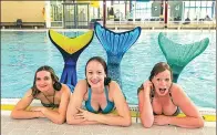  ?? SOPHIE MIGNON / AGENCE FRANCE-PRESSE ?? Three women dressed up as mermaids strike a pose by the pool at the school in Zeist.