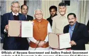  ??  ?? Officials of Haryana Government and Andhra Pradesh Government exchake m O U documents in the presence of Haryana Chief Minister Manohar Lal Khattar and Andhra Pradesh Chief Minister Nara Chandrabab­u Naidu at Andhra Bhawan in New Delhi on Wednesday