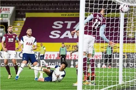  ??  ?? The winner: Tottenham’s Son Heung-min (centre) scoring the only goal of the match against Burnley at Turf Moor.