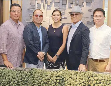  ?? Photos by JOEY VIDUYA ?? Industria Edition creative director and chief designer Jude Tiotuico (second from left) with designers Eric Paras, Lilianna Manahan, Budji Layug and business partner Arthur Viray at the Industria Edition showroom at The Residences Greenbelt.