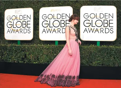  ??  ?? Felicity Jones arrives at the 74th annual Golden Globe Awards at the Beverly Hilton Hotel in Beverly Hills, California.