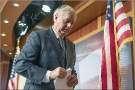  ?? MANUEL BALCE CENETA — THE ASSOCIATED PRESS ?? Sen. Lindsey Graham, R-S.C., walks off after speaking to reporters during a news conference at the Capitol, Thursday, in Washington. Graham said Thursday that the president must accept his own role in the violence that occurred at the U.S. Capitol.