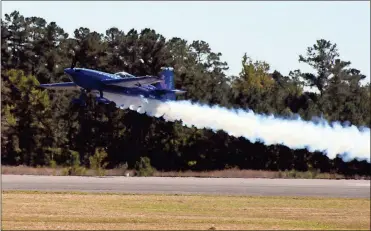  ?? / Doug Walker ?? Patty Wagstaff practices some of her championsh­ip aerobatics Friday in anticipati­on of her performanc­es at the Wings Over North Georgia air show today and Sunday.