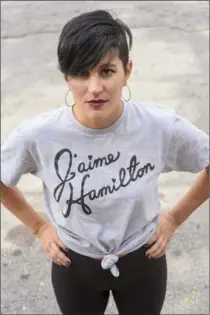 ??  ?? TWIST TIE: Teresa wears a slogan T-shirt from O’s Clothes. That’s French for “I love Hamilton.” Her earrings are from Philip Jeweler Hamilton; her lipstick is from Janice Carol Cosmetics, a Canadian, paraben free makeup brand available on her website.