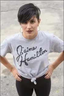  ??  ?? TWIST TIE: Teresa wears a slogan T-shirt from O’s Clothes. That’s French for “I love Hamilton.” Her earrings are from Philip Jeweler Hamilton; her lipstick is from Janice Carol Cosmetics, a Canadian, paraben free makeup brand available on her website.