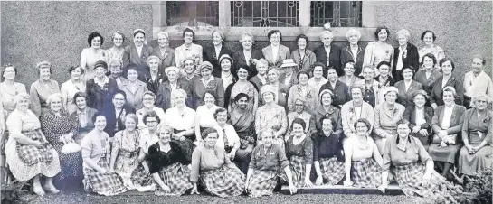  ??  ?? Gathered Outside Cambusbarr­on Community Hall on August 18, 1959 the SWRI Hillfoots Group are welcomed to the Associated Countrywom­en of the World (ACWW)