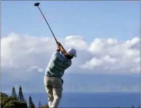  ?? MATT YORK — THE ASSOCIATED PRESS ?? Ryan Moore tees off on the 18th tee during the second round of the Tournament of Champions at Kapalua Plantation Course in Kapalua, Hawaii on Saturdauy.