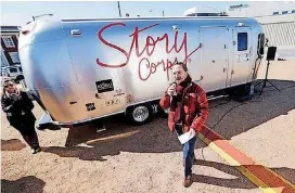  ??  ?? Morgan Feigal-Stickles explains his mission as staffers for StoryCorps record personal audio Thursday in Oklahoma City.