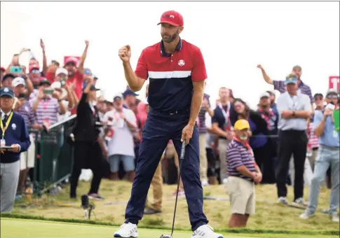  ?? Charlie Neibergall / Associated Press ?? Team USA’s Dustin Johnson reacts to his putt on the 15th hole during a Ryder Cup singles match at the Whistling Straits Golf Course on Sunday in Sheboygan, Wis.