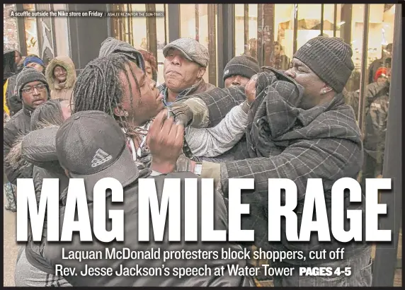  ?? | ASHLEE REZIN/FOR THE SUN-TIMES ?? A scuffle outside the Nike store on Friday