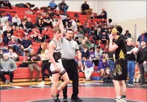  ?? Contribute­d photo ?? Fairfield Warde’s Nate Cuoco, in white, is among the Mustang wrestlers who will miss out on their senior season.