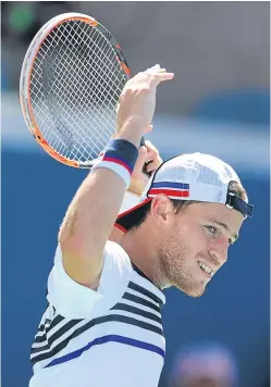  ?? Pictures: AP. ?? A neck injury ended Kyle Edmund’s US Open run in the fourth set of his third-round match against Denis Shapovalov. Meanwhile, Diego Schwartzma­n produced a shock in the bottom half of the men’s draw by defeating fifth seed Marin Cilic.