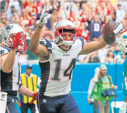  ??  ?? New England’s Michael Floyd celebrates a touchdown during an NFL game.