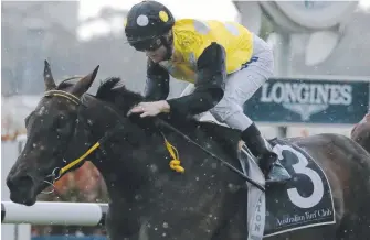  ?? Picture: AAP/JEREMY NG ?? Jockey Zac Purton rides In Her Time to victory in Sydney earlier this year.