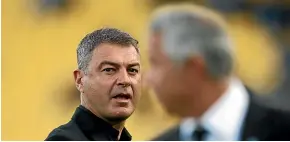  ?? GETTY IMAGES ?? Mark Rudan, left, and his Sydney counterpar­t, Steve Corica, exchange words after the match in Wellington on Wednesday night.