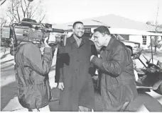  ?? COURTESY OF TAVIS SMILEY ?? Tavis Smiley, center, interviewi­ng Muhammad Ali in 2001 in Berrien Springs, Mich. Burial ceremony is Friday in Louisville.