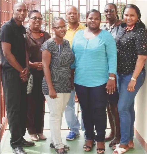  ??  ?? SUNDAY STABROEK, November 27, 2016 Winston Martindale (left), Director of Child Care and Protection, Ann Greene (second, left), and Brian Backer (fourth, left) with administra­tors of the Juvenile Detention Facility at Sophia