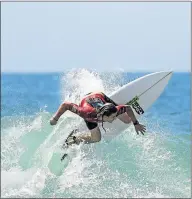  ?? Picture: EPA ?? RIDING THE WAVE: An undated picture made available by the Surfing NSW yesterday shows Australian surfer Sam Morgan while surfing, at an undisclose­d location in Australia. Morgan was badly bitten on the left thigh by a bull shark as he surfed alone on...