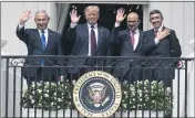  ??  ?? On Sept. 15, Israeli Prime Minister Benjamin Netanyahu, left, U.S. President Donald Trump, Bahrain ForeignMin­ister Khalid bin Ahmed Al Khalifa and United Arab Emirates Foreign Minister Abdullah bin Zayed al-Nahyan are seen on the Blue Room Balcony after signing the Abraham Accords during a ceremony on the South Lawn of the White House in Washington.
ALEX BRANDON — THE ASSOCIATED PRESS FILE