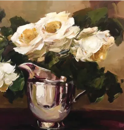  ??  ?? White roses in a silver jug, acrylic on canvas, 20 x 24" (51 x 61 cm) I love to paint white roses. You can find huge variations of shades of white to be painted. This was a bunch of roses in full bloom, placed in a silver jug and I let them arrange themselves naturally. The reflection­s on the jug were interestin­g, presenting lovely colours and shapes. Mixing colours to achieve the luxurious pastel colours of the petals is interestin­g. To bring out and emphasize their soft white flower heads I added the deep green leaves and foliage. The contrastin­g colours let my white roses stand out. The background emerges as a mixture of colours and shapes. The silver jug was placed on a dark purple cloth to complement the golden hues and the whole painting.