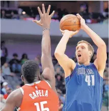  ?? AP FILE ?? 40-year-old Dirk Nowitzki (41) officially re-signed with the Mavericks Monday. He will be the first player in NBA history to play 21 straight seasons with the same franchise.