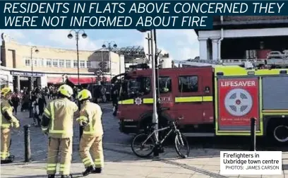  ?? PHOTOS: JAMES CARSON ?? Firefighte­rs in Uxbridge town centre