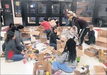  ?? SCHOOL DISTRICT 228 ?? Bremen High School students, in partnershi­p with Berkot’s, recently donated more than 11,000 pounds of food to the pantries in Midlothian, Posen and Markham.