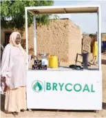  ??  ?? A woman posing by the Brycoal invention. It has become a source of income for many in Kura Local Government