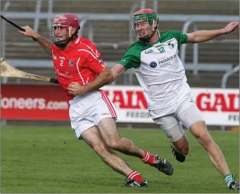  ??  ?? A determined Martin Power (Fethard) beats Daniel Keating of St. James’ to the ball.