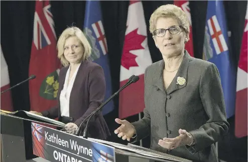  ?? CHRIS YOUNG / THE CANADIAN PRESS ?? Ontario Premier Kathleen Wynne meets Alberta Premier Rachel Notley on Friday. As Ontario looks into reports of publicly-funded colleges operating men-only campuses in Saudi Arabia; the Opposition said “they had to be aware” earlier.